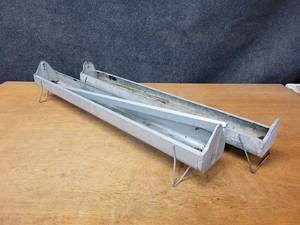 lot 438 image: Pair of Galvanized Chicken Feeders - Make Great Planters - Each is about 36 x 5 x 5 - NO SHIPPING