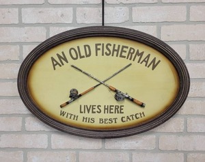 lot 455 image: An Old Fisherman Lives Here Oval Wall Hanging - Measures about 23-12 Across - NO SHIPPING