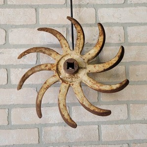 lot 526 image: Antique Cast Iron Rotary Hoe Wall Hanger - About 14 Diameter