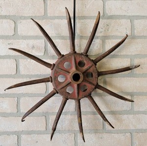 lot 528 image: Antique Cast Iron and Steel Rotary Hoe Wall Hanger - About 17 Diameter