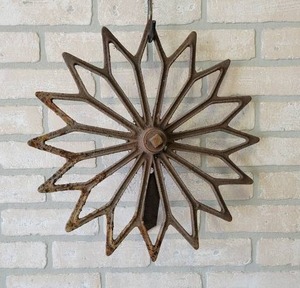 lot 529 image: Antique Cast Iron Rotary Hoe Wall Hanger - About 17 Diameter