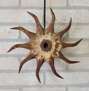 lot 532 image: Antique Cast Iron Rotary Hoe Wall Hanger - About 12 Diameter