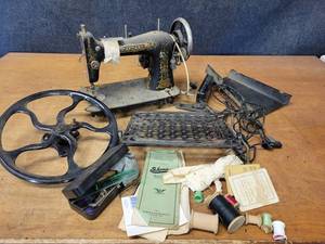 lot 550 image: Antique Standard Sewing Machine - With Cast Iron Treadle, Pullet, Repair Kit and More - NO SHIPPING