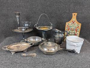 lot 308 image: Large Lot of Silver Plated Serveware, Stainless Steel Pans, and More