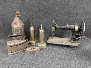 lot 309 image: Lot of Lanterns, Clothing Irons, and Sewing Machine - NO SHIPPING