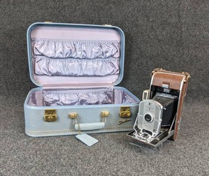 lot 312 image: Vintage Blue Starline Suitcase and Polaroid Land Camera