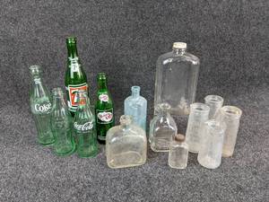 lot 474 image: Lot of Vintage Glass Bottles - Includes 7-UP, Coke, Pepto-Mangan Hexagonal Bottle, and Urine Specimen Bottles NO SHIPPING