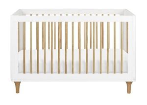 lot 32 image: Babyletto Lolly 3 In 1 Convertible Crib with Toddler Rail in White and Washed Natural (Open Box)