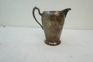 silver on copper pitcher