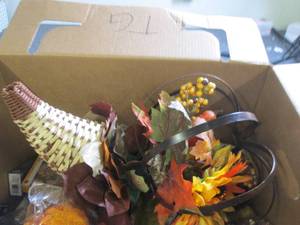 fake flowers, vase, paper plates, a...