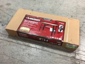 4 ft. Solid Wood Top Workbench in Black by Husky Customer Returns See Pictures