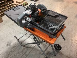 10 in. Wet Tile Saw with Stand by RIDGID Customer Returns See Pictures