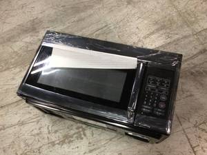 1.6 cu. ft. Over the Range Microwave in Black by Unbranded Customer Returns See Pictures