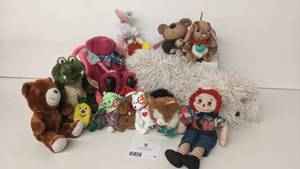 lot 49 image: Stuffed Animals and Friends Collection- Raggedy Andy, TY Beanie Babies, Boyss Bears, Gund, Baby Doll Carriers And More