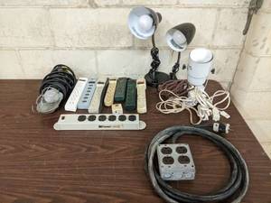 lot 34 image: Lamps and Power Strips-(7) Power Strips  (1) Heavy Gage 4-Outlet Extension Chord  (1) Shop Lamps  (3) Table Lamps  And More