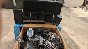 lot 39 image: Large Collection of Assorted Speakers, Electronics, and Wires