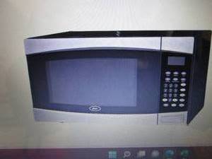 Oster 1.6 Cu. Ft. 1000-Watt Counter...