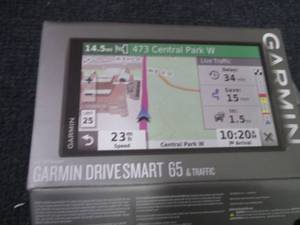 Garmin DriveSmart 65 6.95 GPS Navi...