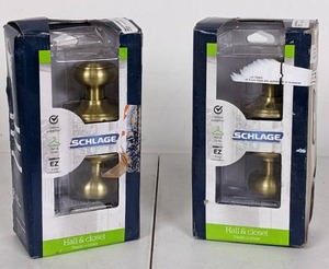 lot 46 image: Schlage, Georgian Satin Brass Passage HallCloset Door Knob (Set of Two)