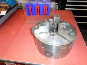 lot 100 image: 10 Warner & Swasey lathe chuck. Looks nearly new. Reversable jaws. As shown. THIS ITEM HAS A RESERVE.