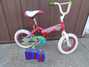 lot 118 image: Dora kids bicycle. Lightly used. As shown.