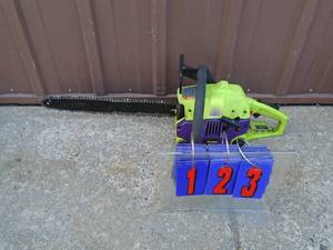 lot 123 image: Poulan wild thing chain saw. Good used condition. Tested & works. As shown.