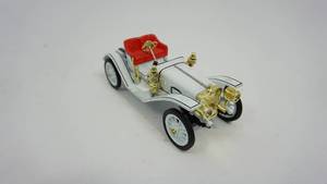 lot 34 image: 1907 Ford Model K Roadster-Made In China- Ford Motor Company Trademarks Used Under License--White With Gold Trim & Red Seats & Rumble Seat---137 Die Cast