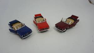 lot 41 image: 1.) Sunnyside Ford Mustang Convertible--Blue SS5719--2.) Sunnyside Ford Mustang Convertible--Red SS5719--3.) Sunnyside Ford Mustang Convertible--Maroon SS5719 -- All Are 137 Die Cast