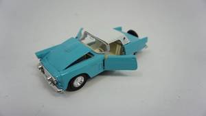 lot 42 image: 1955 Turquoise & WhiteThunderbird  Welley 1956 Thunderbird Made In China--Pull-n-go--- 137 Die Cast