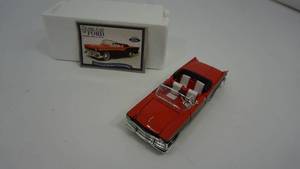 lot 44 image: Red 1957 Ford Skyliner Convertible--Silver Age Of Ford---132 Die Cast