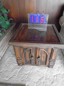 lot 115 image: Wood end table with storage. As shown.