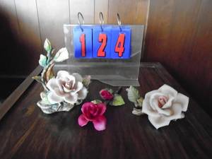 lot 124 image: Porcelian rose figurines.Made in italy with paperwork. Napolian flower. As shown.
