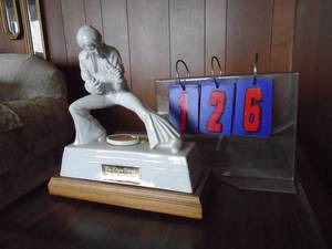 lot 126 image: Elvis musical decanter. McCormack brand sealed found. Box not shown. As shown.