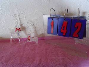 lot 142 image: Qty of 2 glass reindeer. As shown.