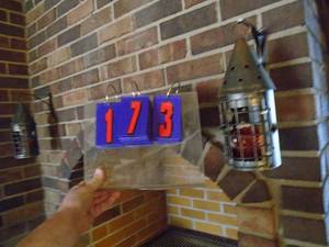 lot 173 image: Qty of 2 old style metal wall hanging candle holders. As shown.