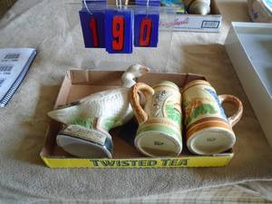 lot 190 image: Full Jim Beam goose decanter & steins. As shown.