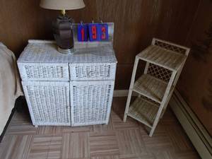 lot 193 image: Wicker cabinet with lamp & rack. As shown.