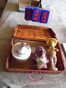 lot 199 image: Wicker basket with cash family jug & figurines. As shown.