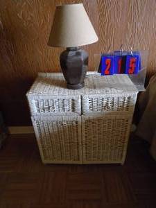 lot 215 image: Wicker stand & lamp. As shown.