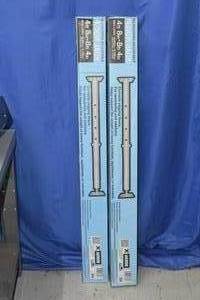 lot 36 image: New Telescoping adjustable floor jacks set of 2