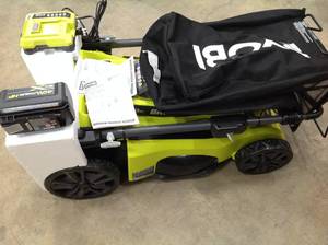 lot 4 image: Ryobi 21 in Battery Lawn Mower - includes 6Ah Battery and Charger - Good condition - review all pictures