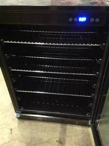 lot 11 image: The Home Depot Magic Chef Beverage 23.4 in. 154 (12 oz.) Can Beverage Cooler, Stainless Steel HMBC58ST good condition - review all pictures