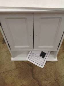 lot 25 image: Zenna Home 21.5 in. W x 24 in. H Bathroom Storage Wall Cabinet in White - has minor dents - review all pictures
