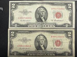 Two Red Seal $2 Dollar Bills