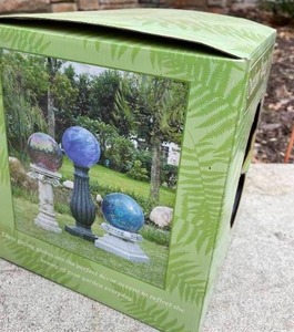 lot 214 image: Outdoor Designs 10 Inch Blue Chrome Swirl Gazing Ball
