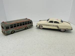 lot 32 image: 2 Vintage tin Litho Friction Powered Vehicles