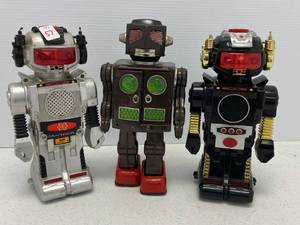 lot 57 image: Three Vintage Battery Operated Robots