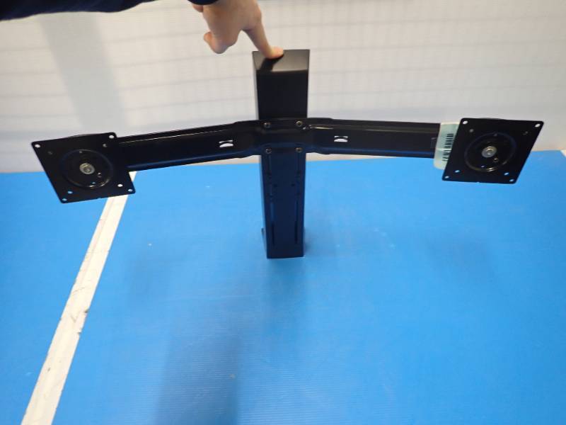 Dual LCD Mount  has mounting holes on bottom and mounting screws  also includes 8 monitor screws