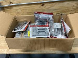 lot 114 image: Box Full of Staplers