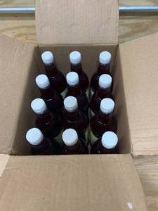 lot 115 image: SNO-KONE Case of Strawberry Snow Cone Syrup (12 Bottles- 25 oz. Each)